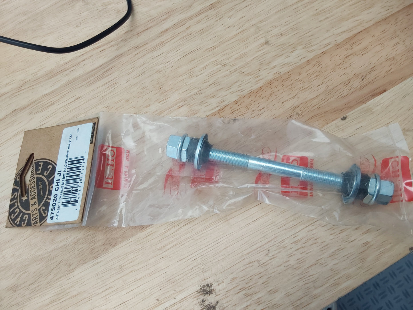 FRONT AXLE SET BMX SOLID 3/8x140mm W/DUST CAP