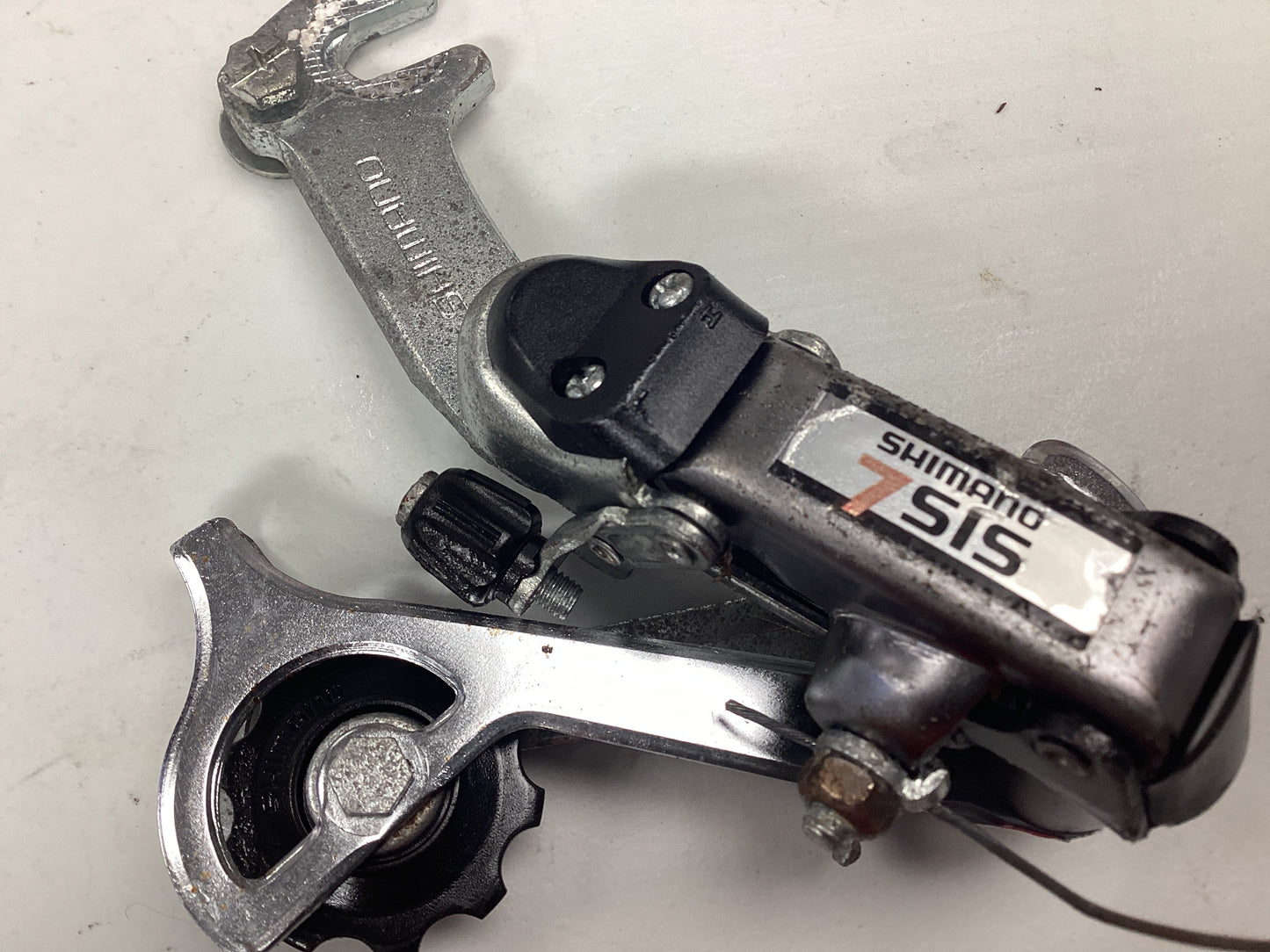 USED Shimano SIS rear derailleur claw hanger